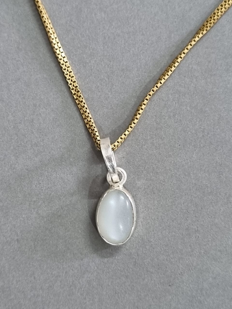 Moonstone pendant in gold chain