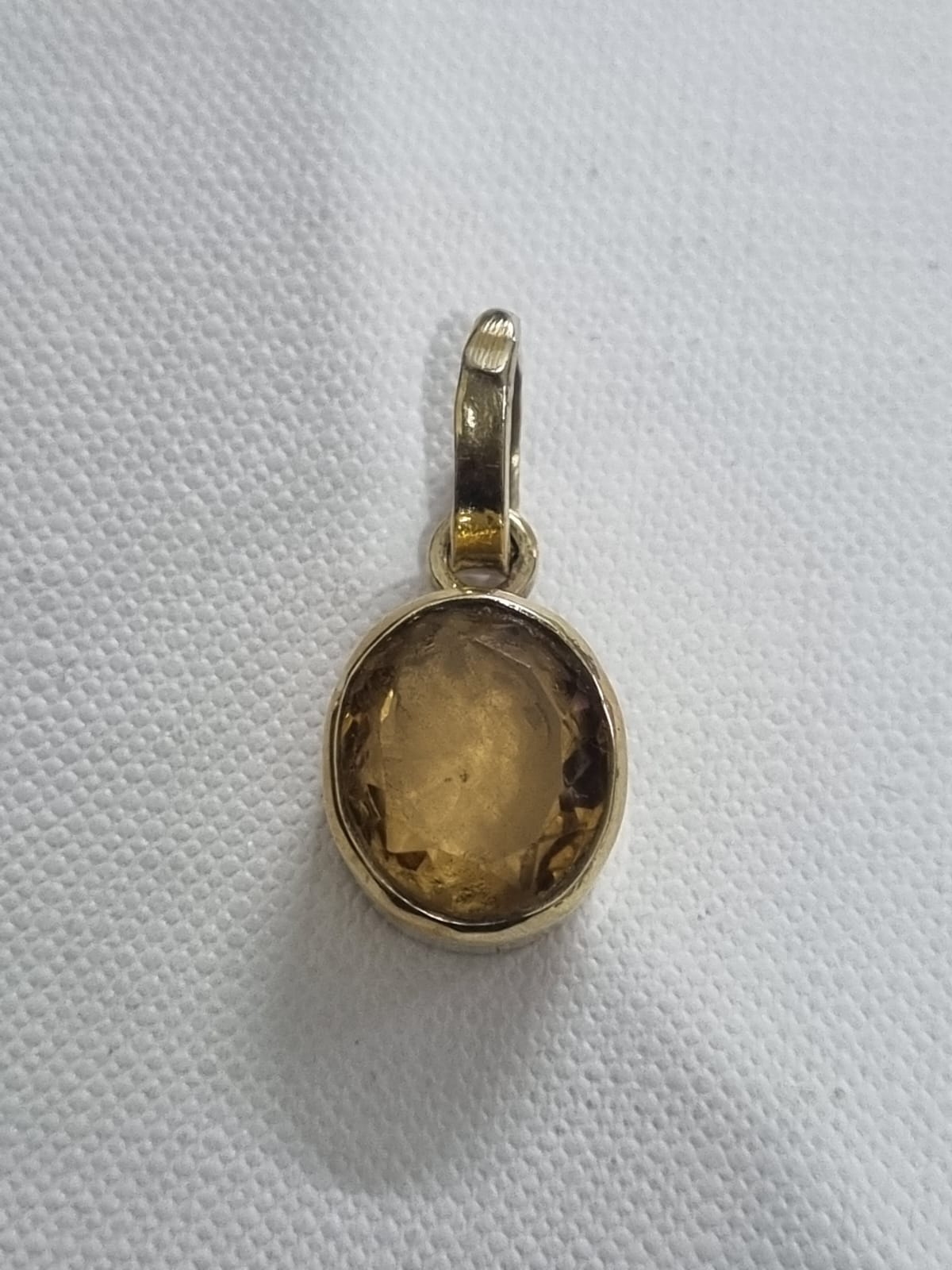 Yellow Topaz pendant in panchdhatu